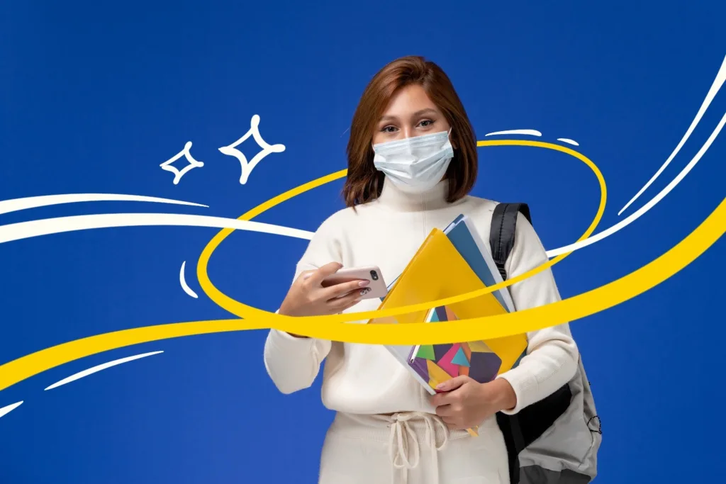 Учні навчаються в гібридному форматі — частина в класі, частина онлайн через ноутбук