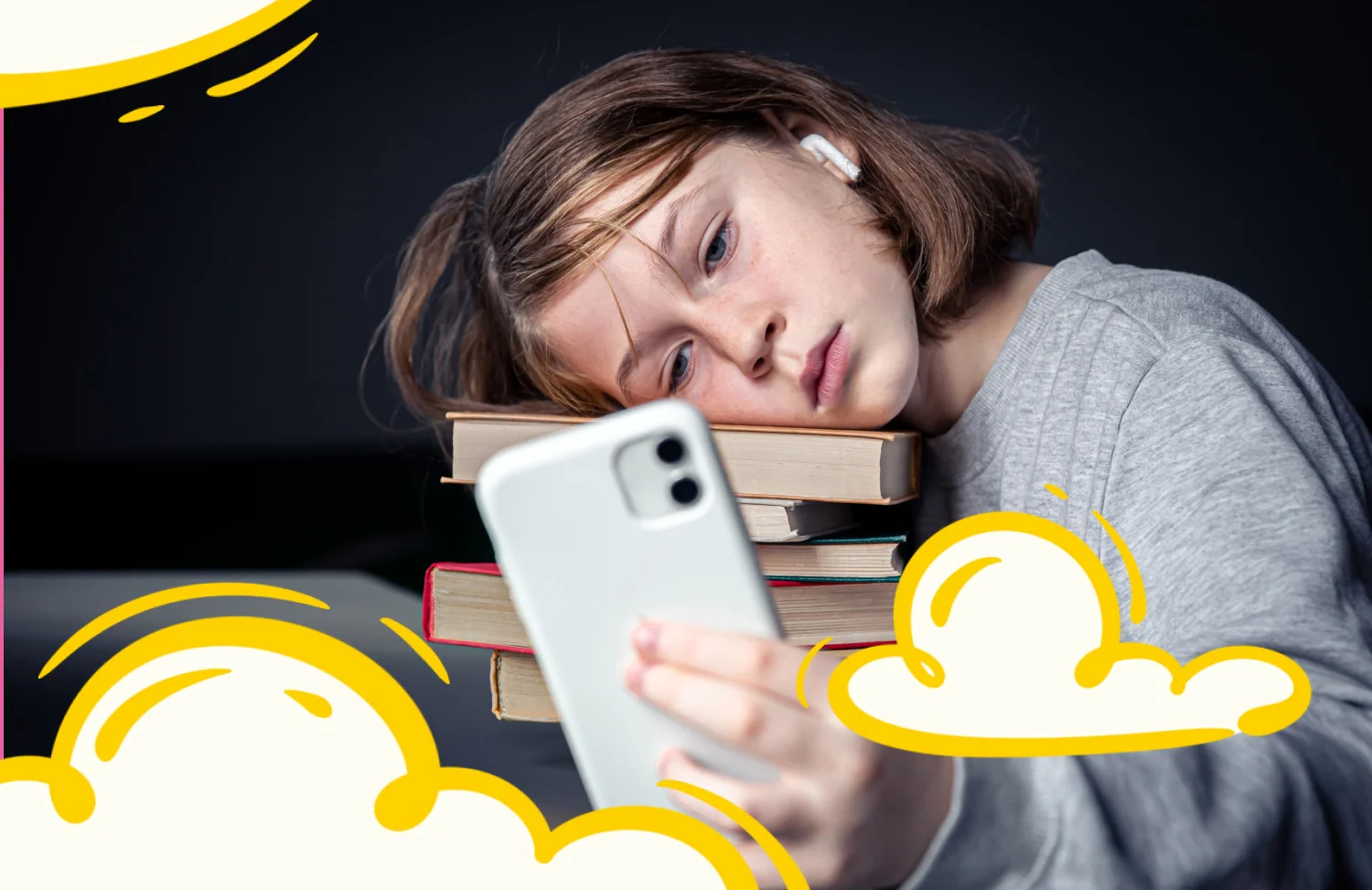 Підліток із телефоном у руках замислено дивиться в екран — символ сучасного покоління та цифрових викликів